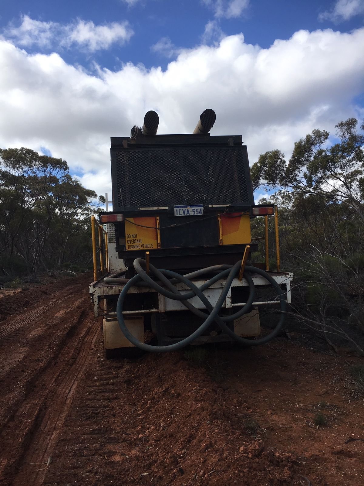 Machinery beside an obviously wet access track in Cocanarup, July 2017 - Exploration