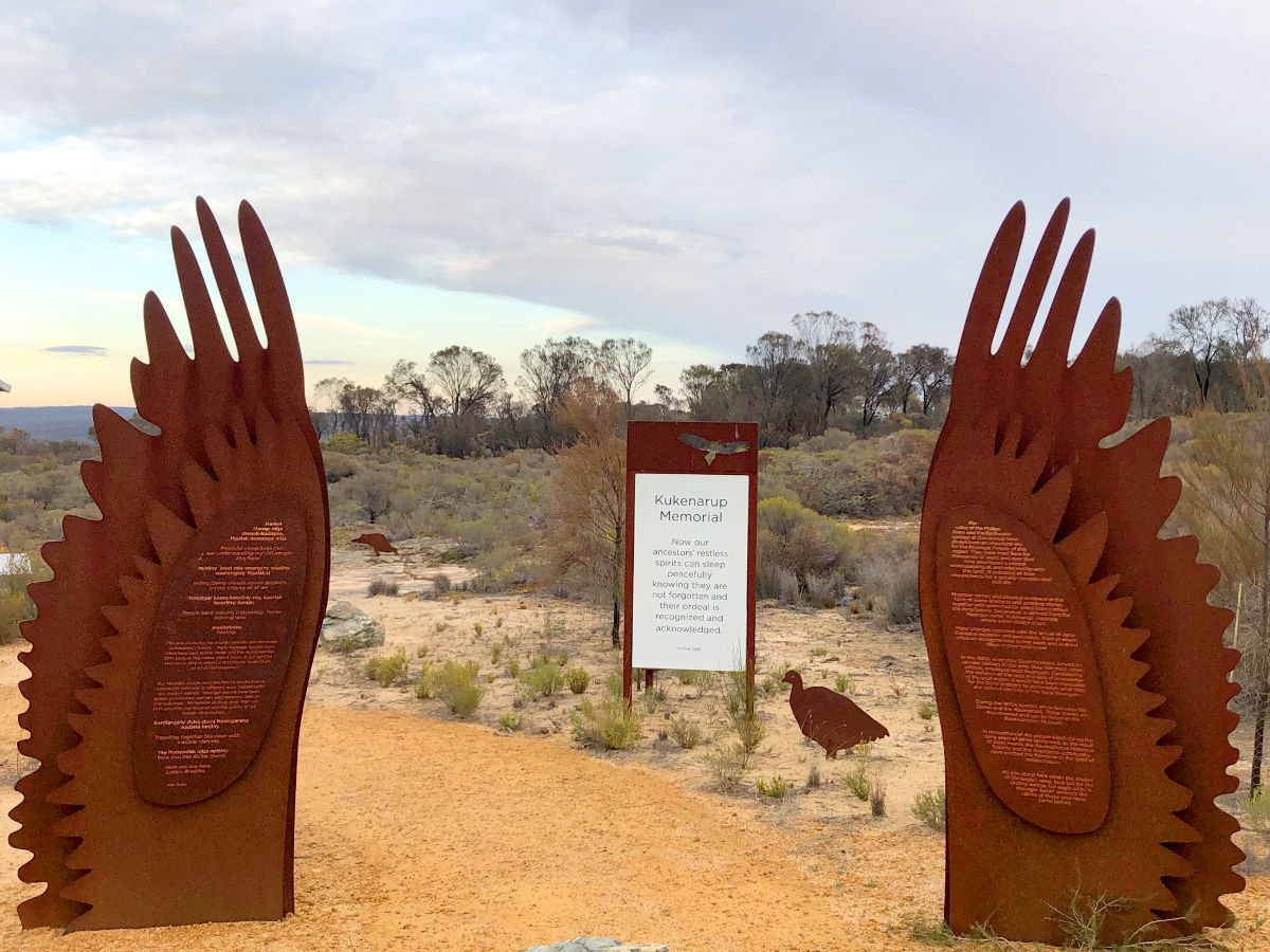 The entrance to the Kukenarup Memorial features steel eagle’s wings with words in both English and Noongar - Home